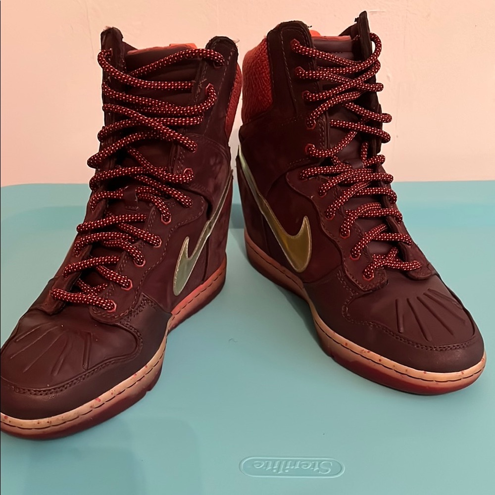 Nike High-Top Sneakers with Orange and Gold Accents